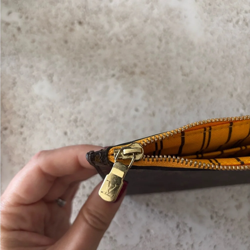 Authentic Louis Vuitton mimosa yellow lining Neverfull GM pouch wristlet